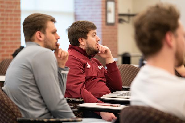 Students in a lecture, listening